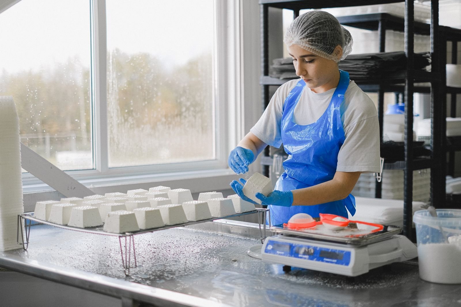 Food-production worker in a processing facility